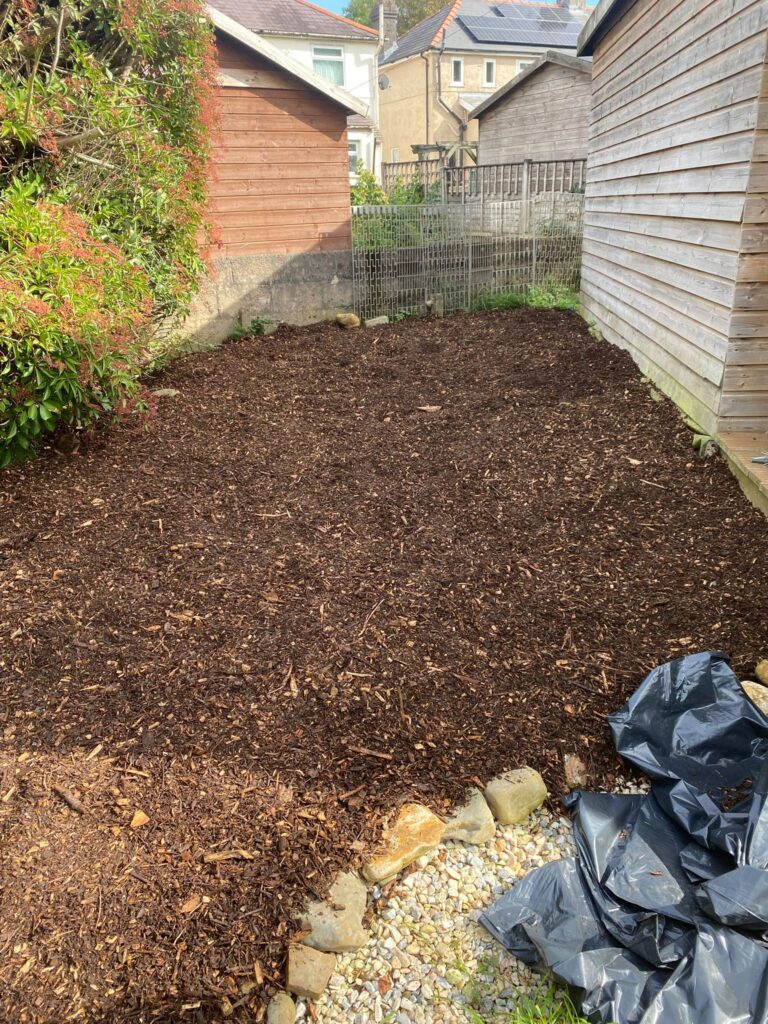Wood Chippings Laid to Garden in Caerphilly